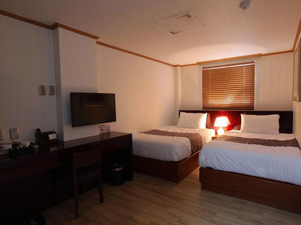 Hotel Daewoo Inn : photo 1 de la chambre chambre lits jumeaux