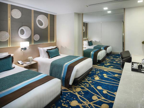 Solitaire Bangkok Sukhumvit 11 : photo 2 de la chambre chambre lits jumeaux supérieure sans fenêtre