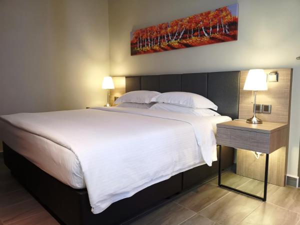 KSL Hot Spring Resort : photo 1 de la chambre chambre lit king-size standard