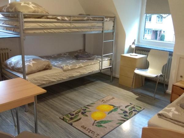The Old Doctors Office : photo 5 de la chambre chambre triple avec salle de bains commune