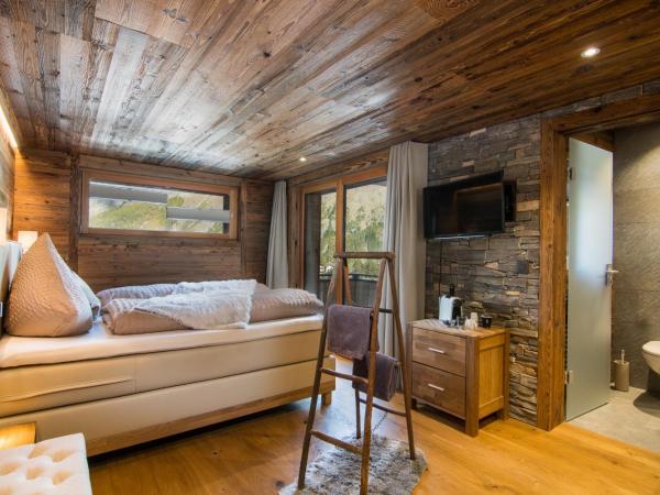 Boutique Lodge Spycher : photo 2 de la chambre chambre double deluxe avec balcon - vue sur montagne