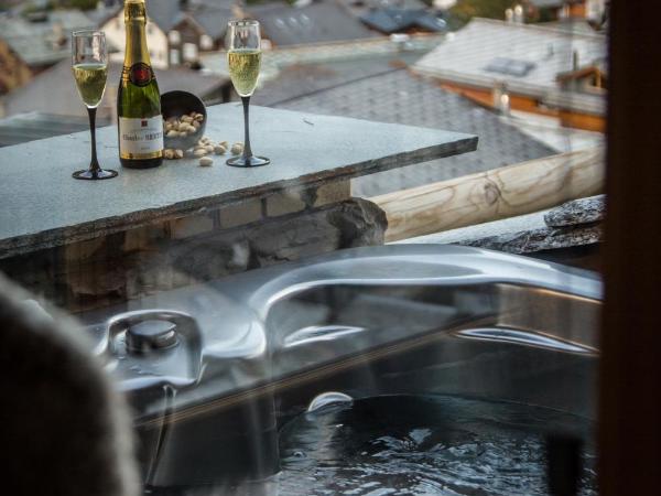 Boutique Lodge Spycher : photo 3 de la chambre suite deluxe avec sauna et baignoire spa extérieure