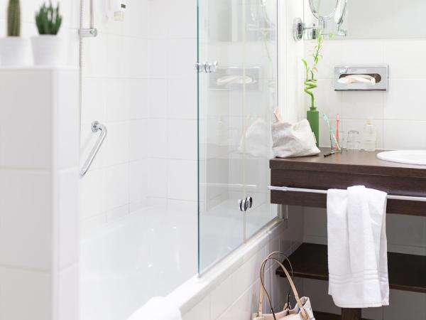 Boutiquehotel Stadthalle : photo 5 de la chambre chambre triple supérieure