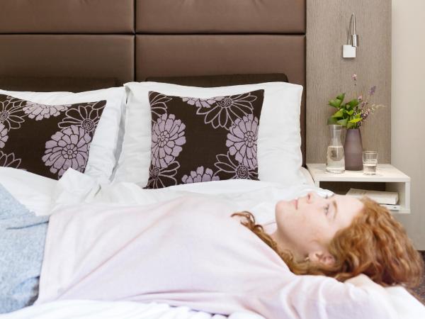 Boutiquehotel Stadthalle : photo 8 de la chambre chambre triple confort avec vue sur jardin