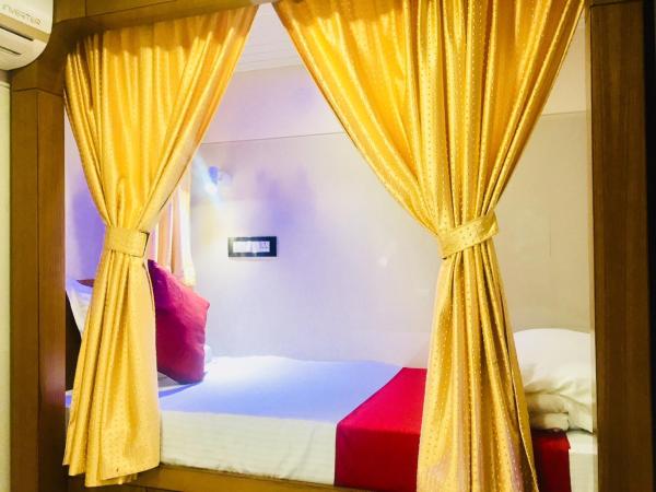 Qubestay Airport Capsule Hotel & Hostel : photo 2 de la chambre lit simple dans dortoir de 4 lits