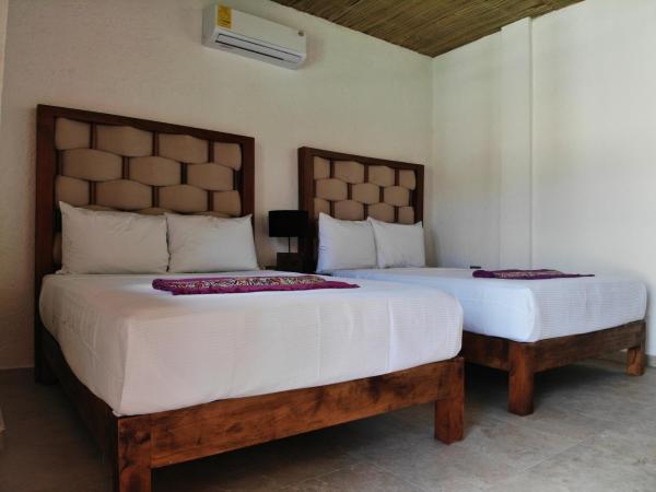 Kinta Kan Hotel Boutique Cozumel : photo 6 de la chambre chambre double avec 2 lits doubles