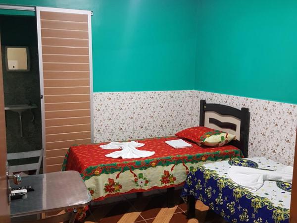 Pousada Pouso Feliz : photo 1 de la chambre chambre lits jumeaux