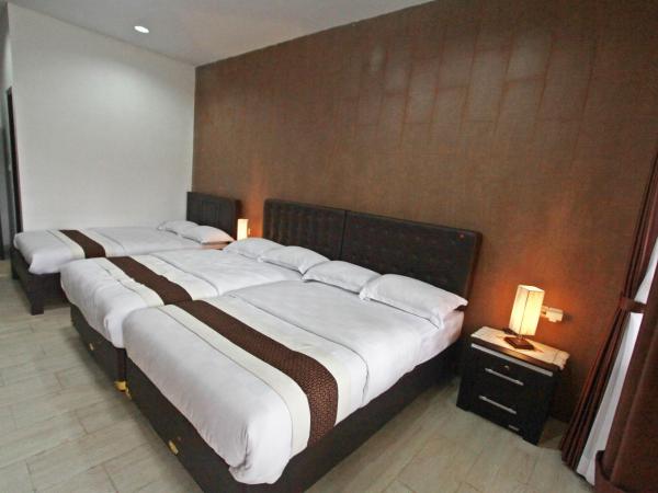 BeOne House Jogja : photo 1 de la chambre chambre familiale exécutive