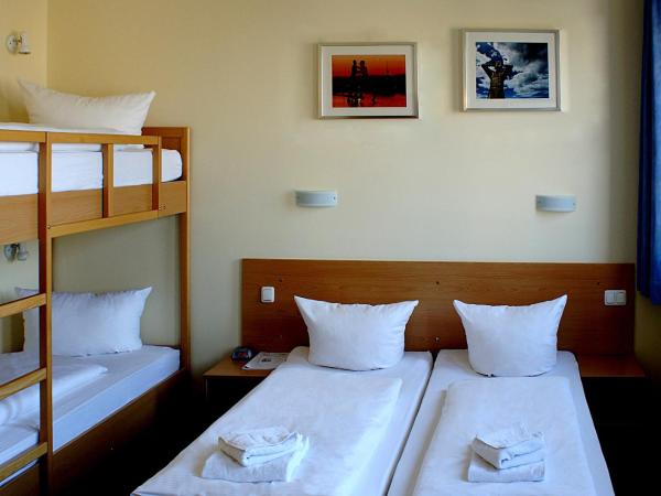 Familienhotel Citylight : photo 4 de la chambre chambre quadruple