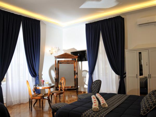 Di Palma Suite : photo 2 de la chambre chambre quadruple de luxe