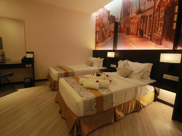 Amamas Boutique Hotel Kuching : photo 5 de la chambre chambre lits jumeaux sans fenêtre