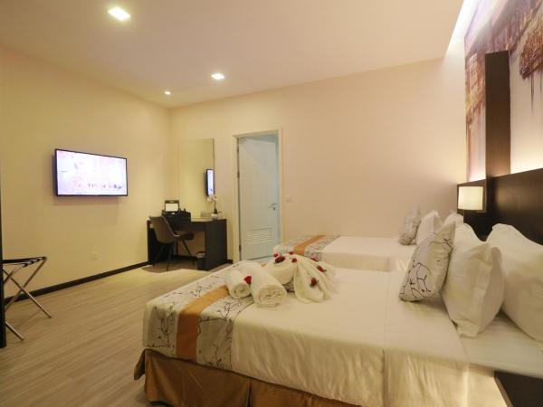 Amamas Boutique Hotel Kuching : photo 2 de la chambre chambre lits jumeaux sans fenêtre