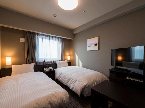 Hotel Route-Inn Grand Tokyo Asakusabashi : photo 1 de la chambre chambre lits jumeaux - non-fumeurs