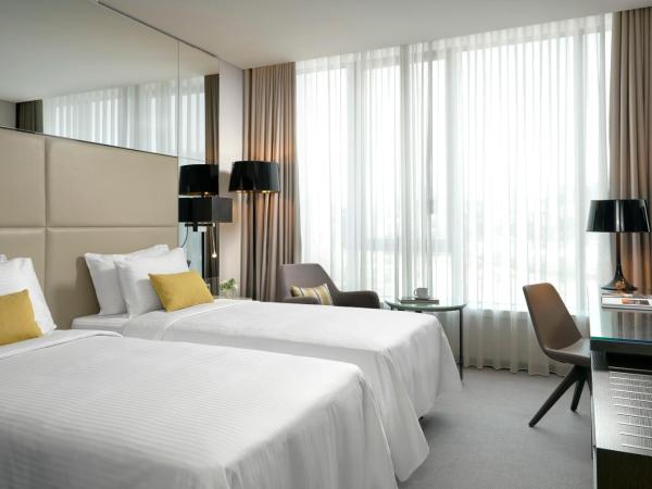 Centro Westside by Rotana : photo 3 de la chambre chambre lits jumeaux - vue sur ville