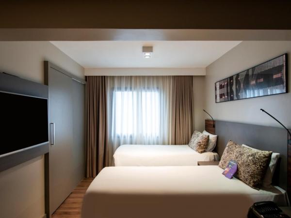 Mercure Curitiba Batel : photo 2 de la chambre appartement standard avec lits jumeaux