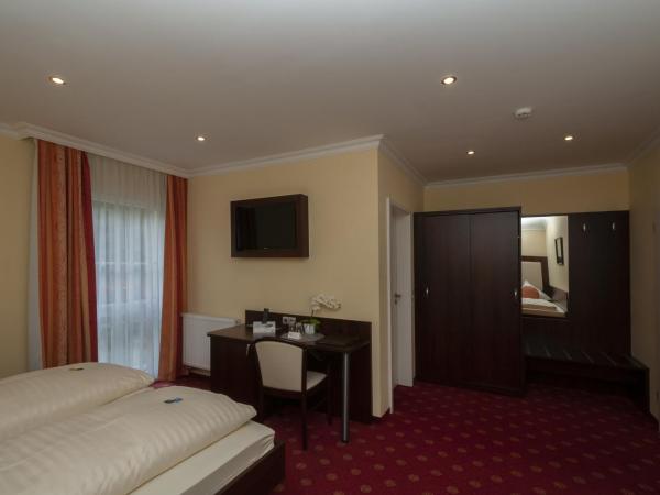 Hotel Grüne Tanne : photo 10 de la chambre chambre triple deluxe
