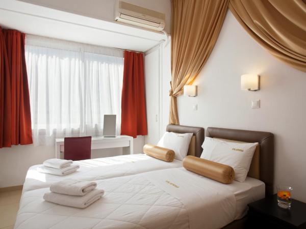 Metropolis Hotel : photo 9 de la chambre chambre double ou lits jumeaux standard