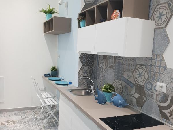 Nereidi Suites : photo 3 de la chambre chambre double deluxe avec balcon - vue sur mer