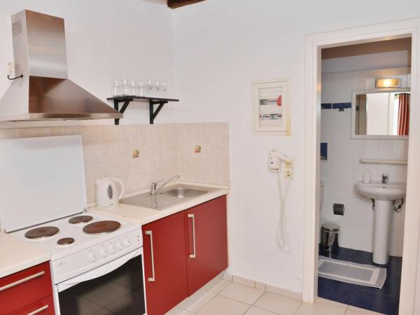 Paradisia Villas : photo 5 de la chambre appartement - vue sur jardin