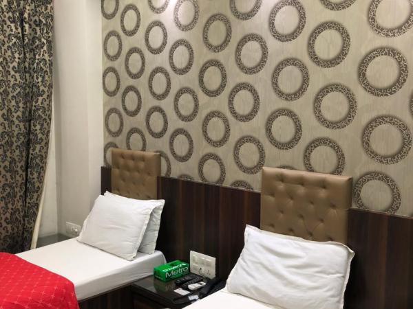 Hotel Antique - Colaba : photo 2 de la chambre chambre deluxe double ou lits jumeaux