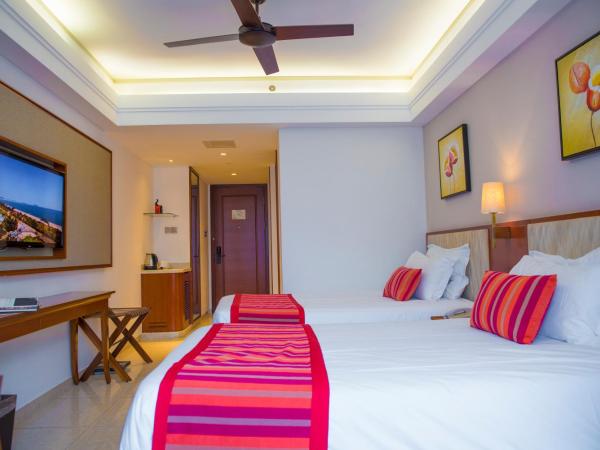 Sanya Seacube Holiday Hotel : photo 6 de la chambre chambre lit king-size ou lits jumeaux supérieure - vue sur mer