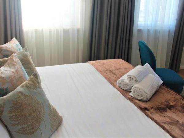 Silver Seahorse Garden Retreat : photo 2 de la chambre chambre lit king-size supérieure