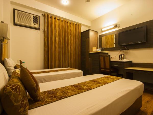 Hotel Sunstar Heights : photo 6 de la chambre petite chambre double ou lits jumeaux