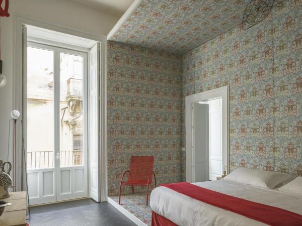 Asmundo di Gisira : photo 2 de la chambre chambre lit king-size avec balcon