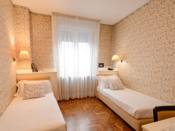 Hotel Continental : photo 5 de la chambre chambre lits jumeaux