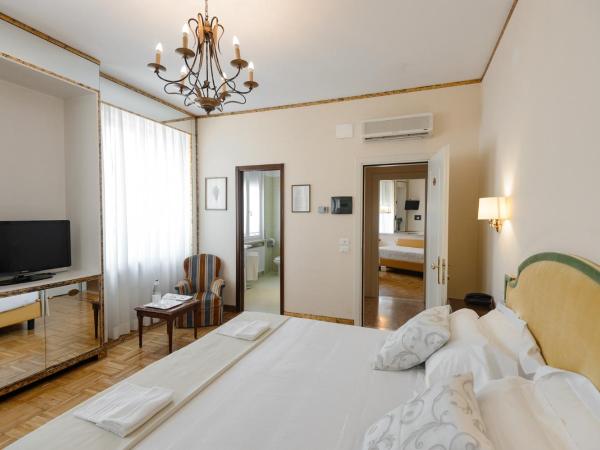 Hotel Continental : photo 2 de la chambre chambre familiale (2 adultes et 2 enfants)