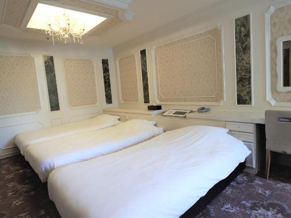 Royal Hotel Shinokubo : photo 1 de la chambre chambre triple avec lit d'appoint - non-fumeurs 