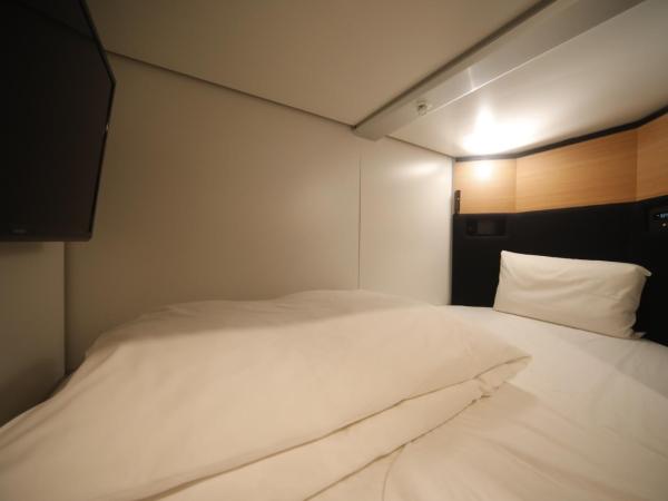 Dormy Inn Korakuen : photo 4 de la chambre lit simple dans dortoir pour hommes - enregistrement après 17h00, départ avant 10h00