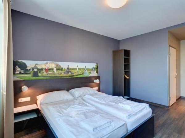 MEININGER Hotel Wien Downtown Sissi : photo 1 de la chambre chambre lits jumeaux