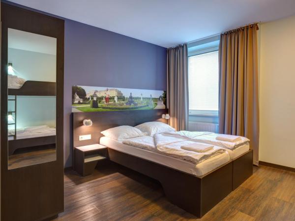 MEININGER Hotel Wien Downtown Sissi : photo 3 de la chambre chambre quadruple