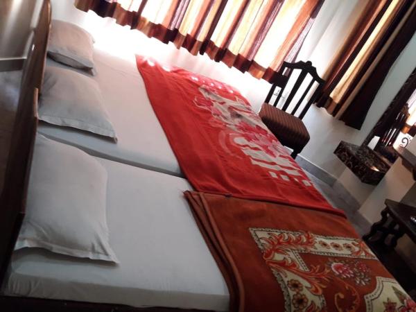 Hotel Hari Home : photo 5 de la chambre chambre triple deluxe