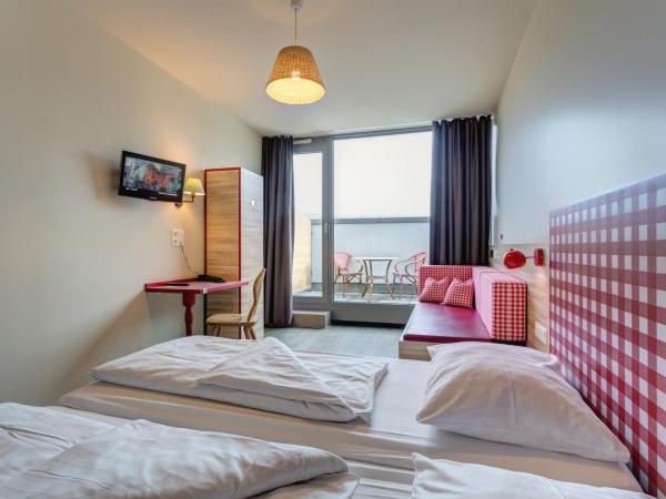 MEININGER Hotel Salzburg City Center : photo 2 de la chambre chambre lits jumeaux supérieure