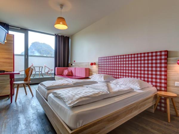 MEININGER Hotel Salzburg City Center : photo 1 de la chambre chambre lits jumeaux supérieure