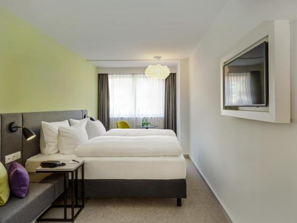 H+ Hotel Wien : photo 3 de la chambre chambre double ou lits jumeaux