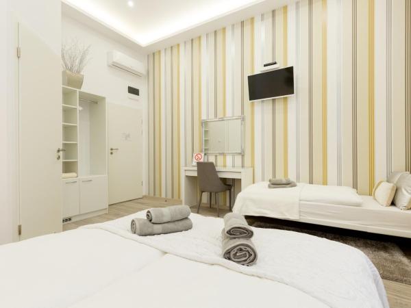 SB Panzió : photo 1 de la chambre chambre triple deluxe