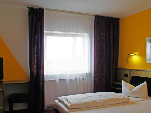 Hotel am Buschkrugpark : photo 2 de la chambre chambre simple