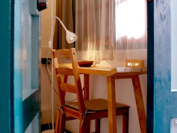 T-Boutique Hostel - Hua Lamphong : photo 5 de la chambre chambre lits jumeaux standard avec salle de bains commune