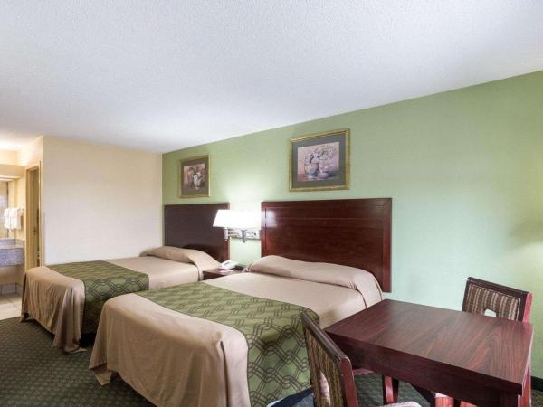 Rodeway Inn & Suites : photo 1 de la chambre chambre 2 lits queen-size - non-fumeurs