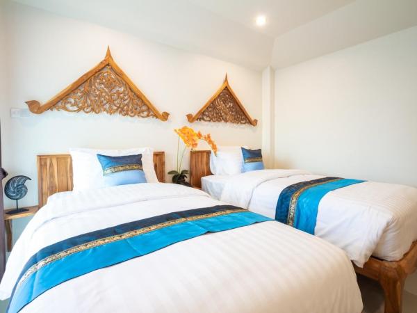 Anumat Premium Budget Hotel : photo 2 de la chambre chambre lits jumeaux avec balcon