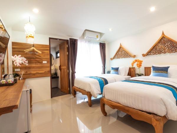 Anumat Premium Budget Hotel : photo 1 de la chambre chambre lits jumeaux avec balcon