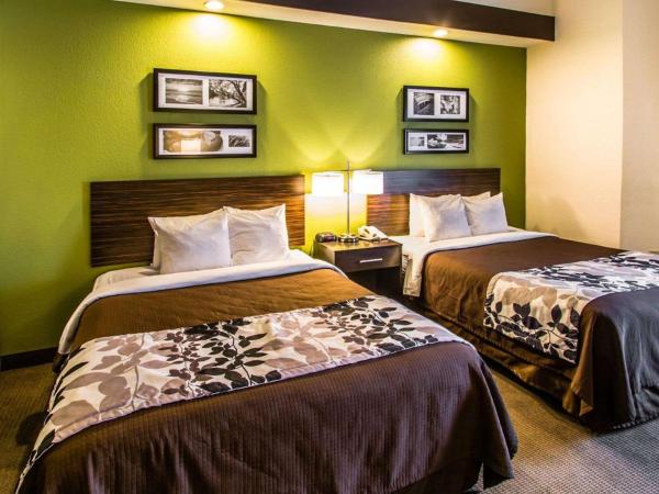 Sleep Inn & Suites Orlando International Airport : photo 7 de la chambre chambre avec 2 grands lits queen-size 