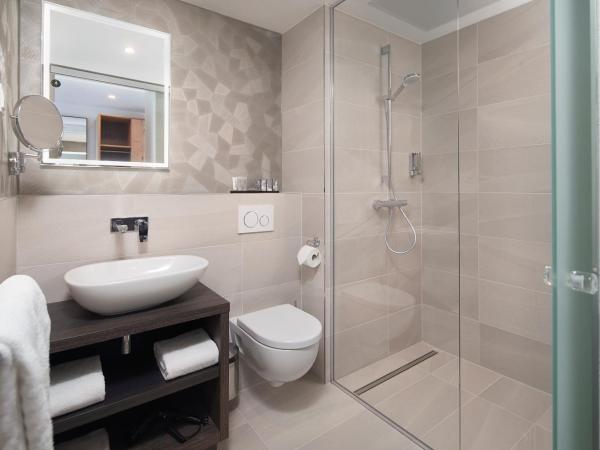 Inntel Hotels Utrecht Centre : photo 1 de la chambre chambre lits jumeaux ville