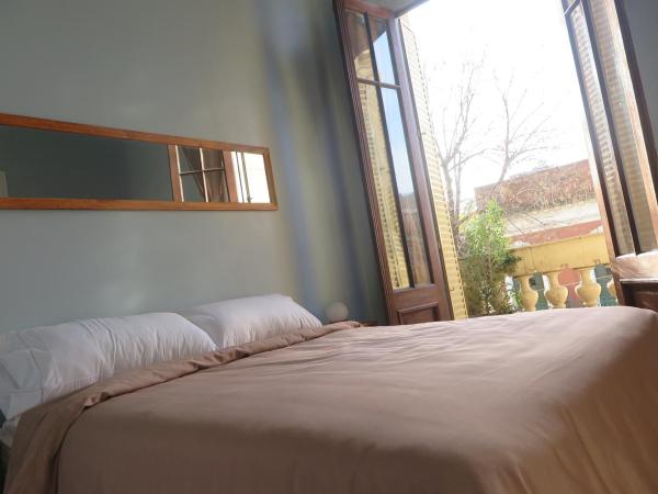 Sabatico Travelers Hostel & Guesthouse : photo 4 de la chambre chambre double avec balcon