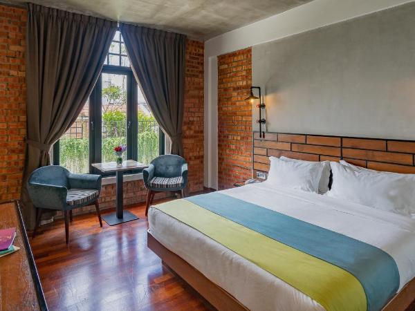 Treasures Hotel and Suites : photo 4 de la chambre chambre lit king-size de luxe 