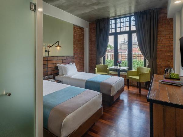 Treasures Hotel and Suites : photo 5 de la chambre chambre lits jumeaux de luxe 