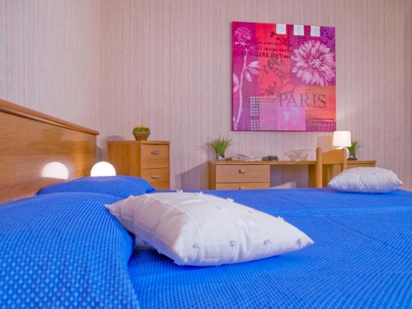 Hotel Residence Ulivi E Palme : photo 2 de la chambre chambre quadruple